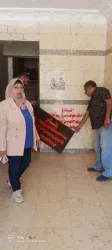 حملة مكبرة بحي الكوثر لتسريع ملفات التصالح وإغلاق المحال المخالفة